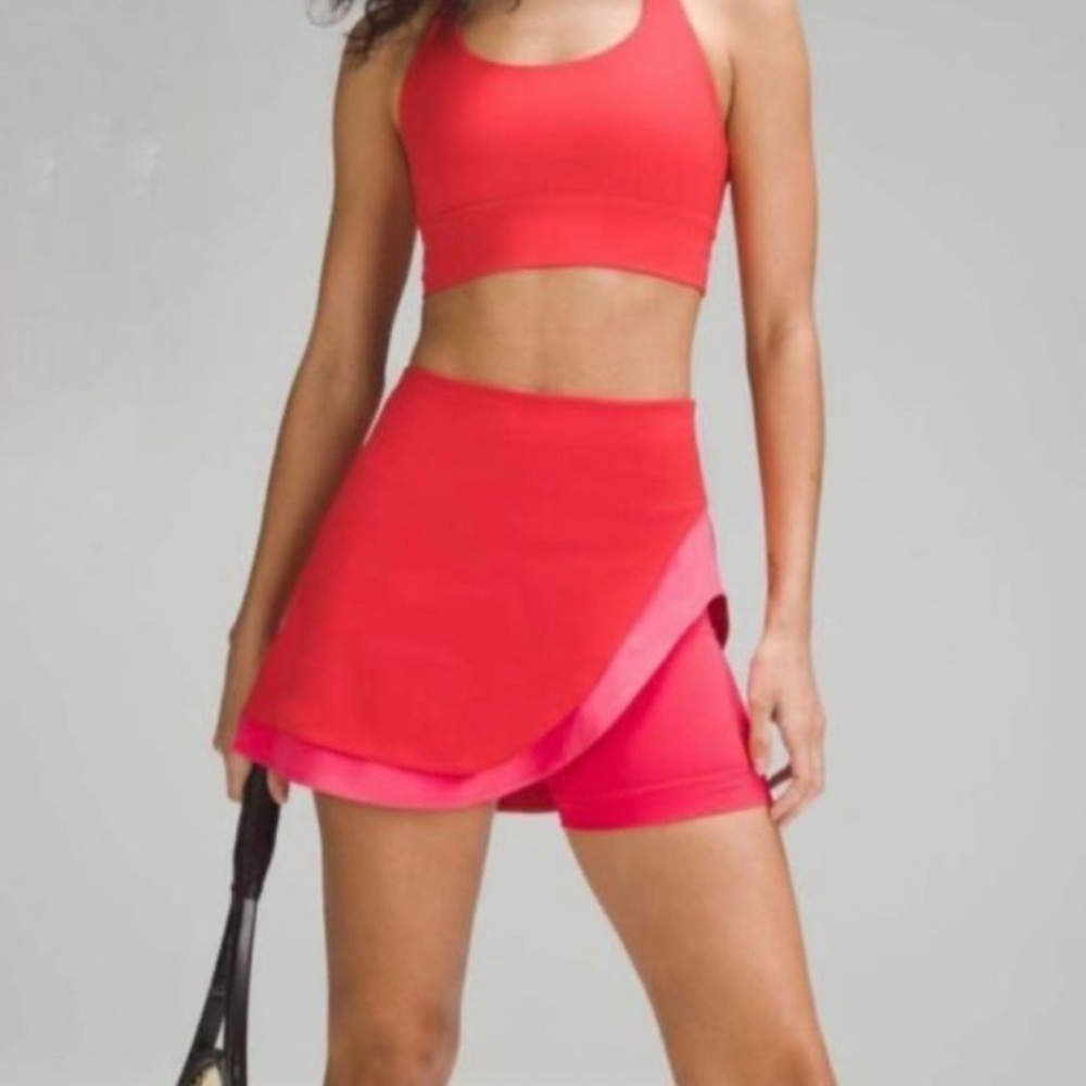 Lululemon sz 0 asymmetrical layered high rise tennis skirt in red pink layers